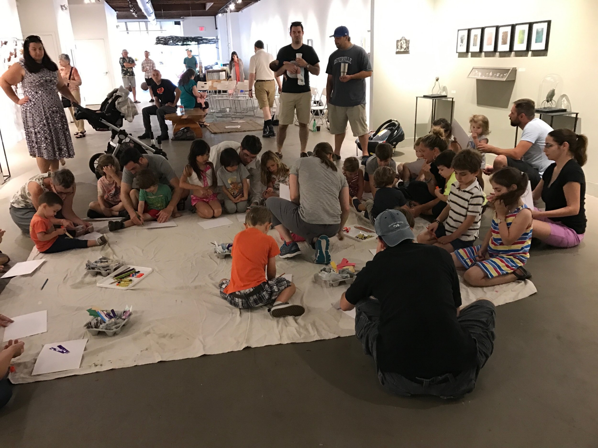 Community members working on art together